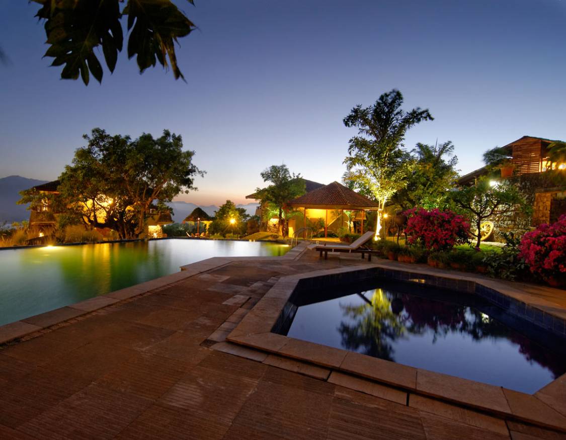 Outdoor Pool Area at Malhar Machi