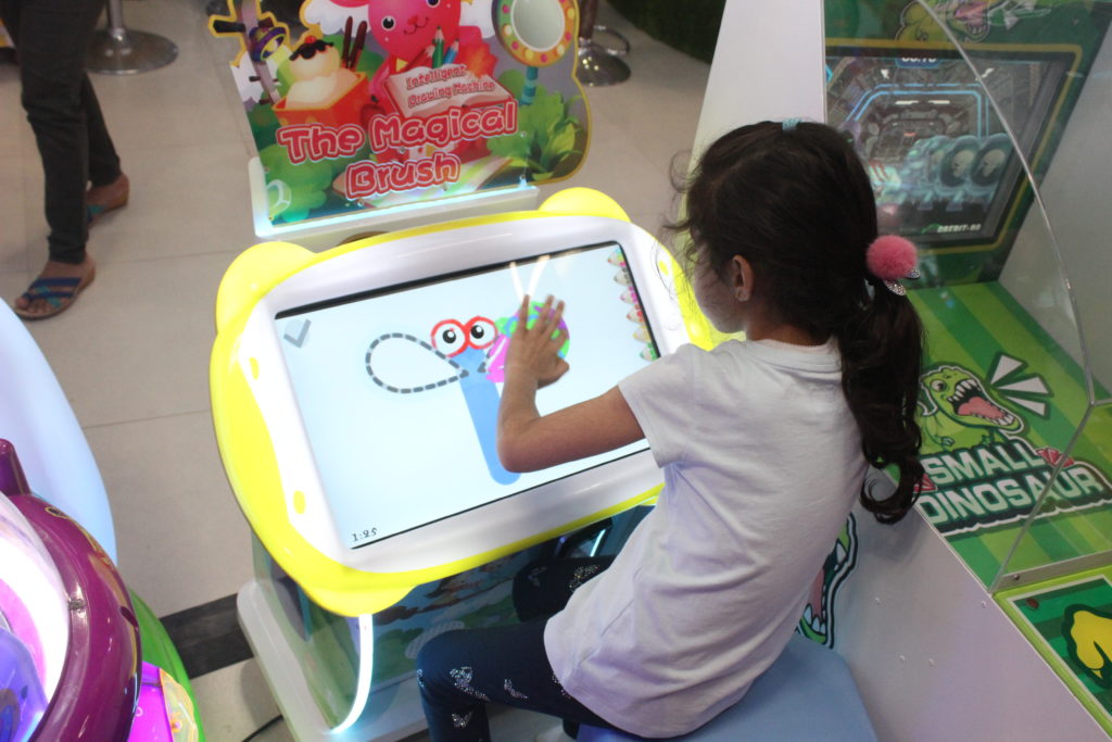Girl enjoying the interactive learning games