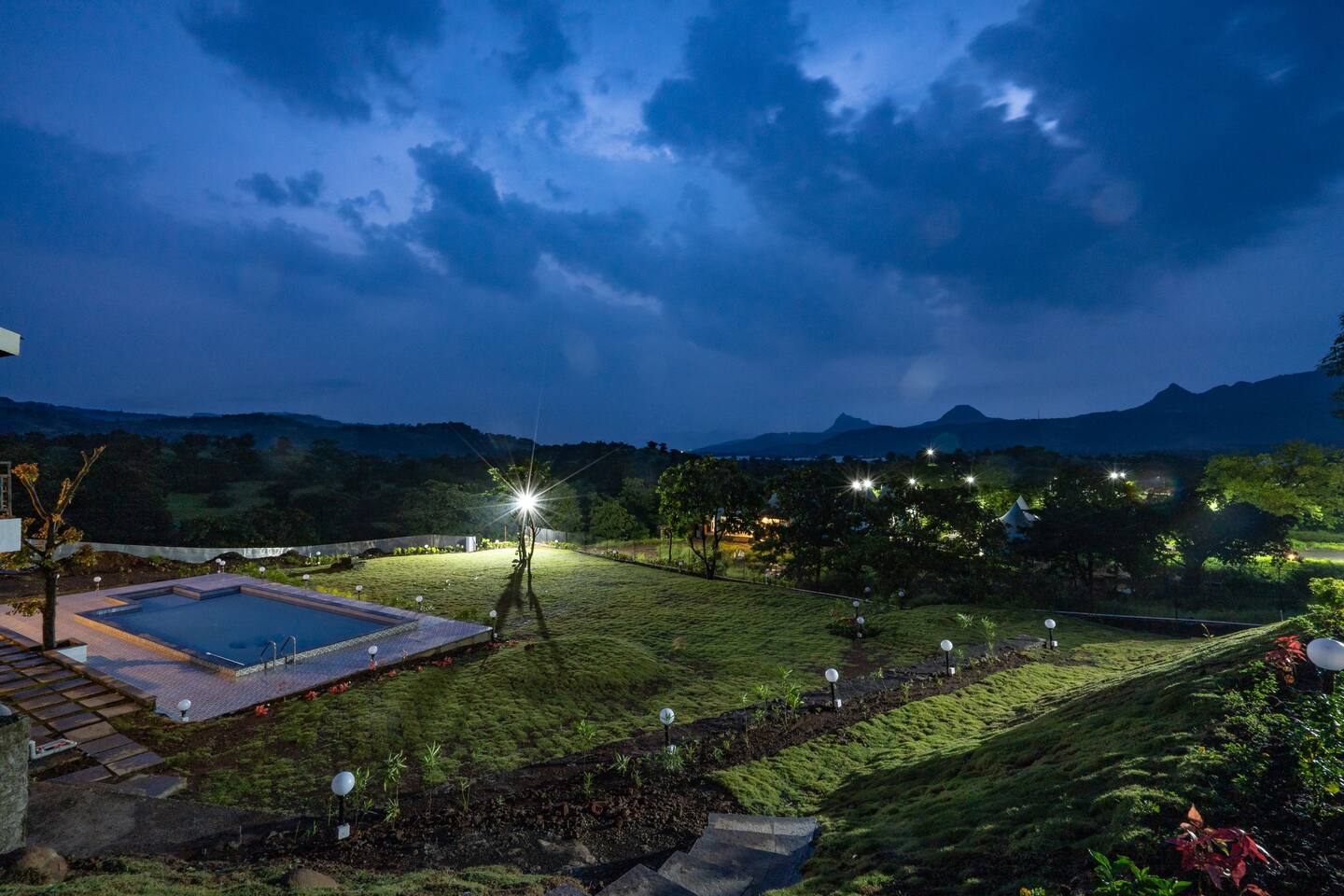 Nighttime Exterior View of Leisurely By The Foothills