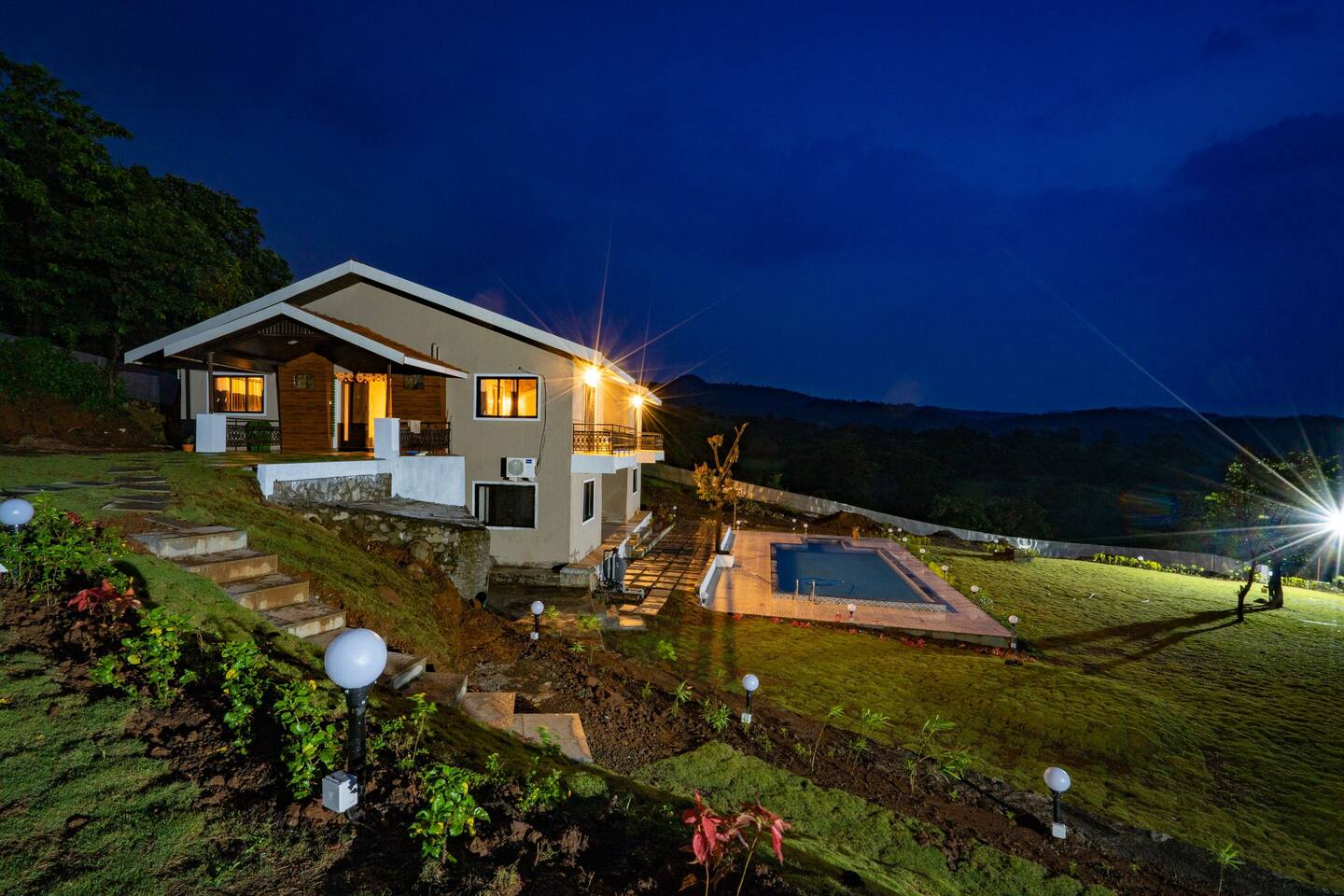 Nighttime Exterior View of Leisurely By The Foothills